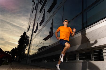 Man Jogging Stock Photo - Premium Royalty-Free, Code: 600-01616514