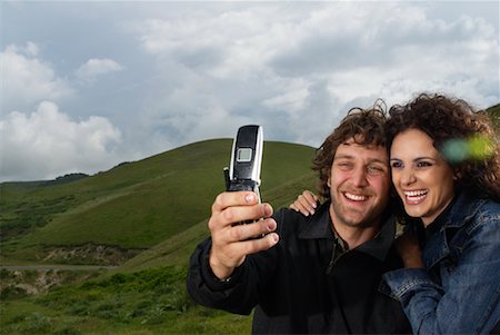 simsearch:600-00933801,k - Couple with Cellphone Foto de stock - Sin royalties Premium, Código: 600-01616916