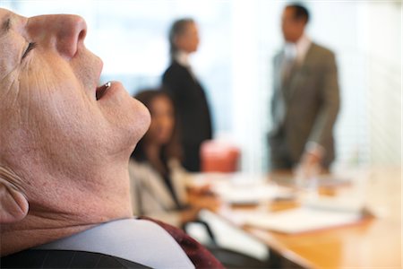 Man Sleeping During Business Meeting Foto de stock - Sin royalties Premium, Código: 600-01613742