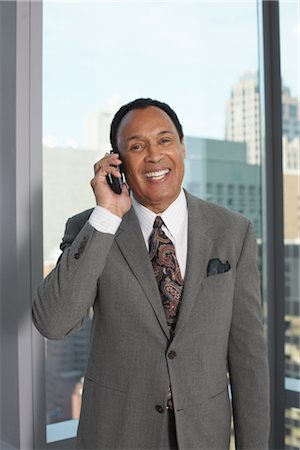 simsearch:600-02833757,k - Businessman Talking on Cell Phone Foto de stock - Royalty Free Premium, Número: 600-01613886