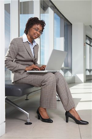 Businesswoman Using Laptop Computer Stock Photo - Premium Royalty-Free, Code: 600-01613908