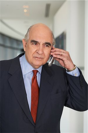 Businessman with Cellular Phone Stock Photo - Premium Royalty-Free, Code: 600-01613963