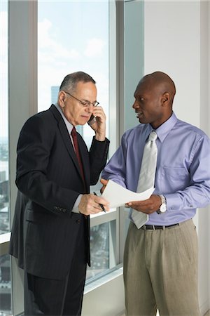 simsearch:700-03152537,k - Businessmen in Office Stock Photo - Premium Royalty-Free, Code: 600-01613994