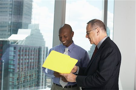 simsearch:614-00651999,k - Businessmen Looking at Document Stock Photo - Premium Royalty-Free, Code: 600-01613991