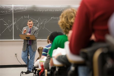 presenting to a group casual - Professor in Classroom Stock Photo - Premium Royalty-Free, Code: 600-01633160