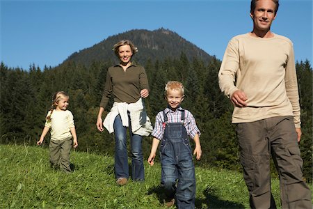 father and son overalls - Family Walking Outdoors Stock Photo - Premium Royalty-Free, Code: 600-01644973