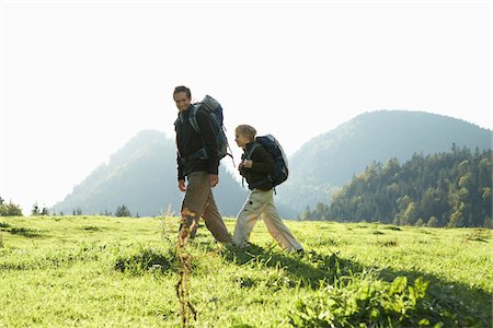 father son caucasian walking two people casual clothing - Father and Son Hiking Stock Photo - Premium Royalty-Free, Code: 600-01645044