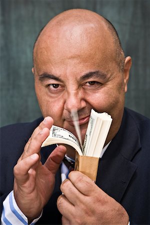 sin - Portrait of Businessman with Cash Stock Photo - Premium Royalty-Free, Code: 600-01646056