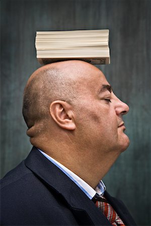 simsearch:700-02797985,k - Businessman with Stack of Cash on Head Fotografie stock - Premium Royalty-Free, Codice: 600-01646060