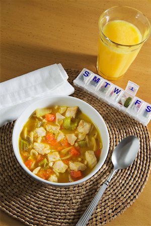 simsearch:600-01646073,k - Chicken Soup with Orange Juice and Pills Stock Photo - Premium Royalty-Free, Code: 600-01646073