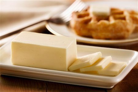 Close-up of Butter and Waffles Stock Photo - Premium Royalty-Free, Code: 600-01646231