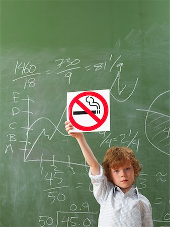 Boy Holding No Smoking Sign Stock Photo - Premium Royalty-Free, Code: 600-01646309