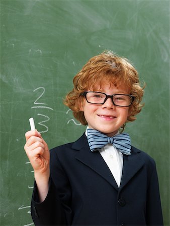 simsearch:614-03469507,k - Portrait of Boy at School Fotografie stock - Premium Royalty-Free, Codice: 600-01646315