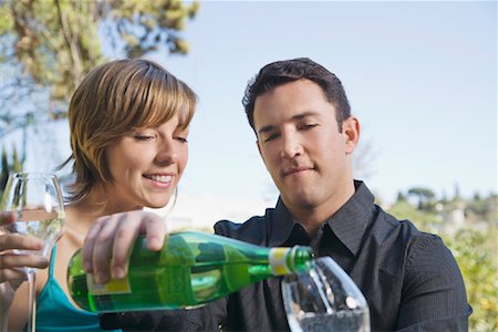 soda water - Couple Drinking Sparkling Water Stock Photo - Premium Royalty-Free, Code: 600-01694116