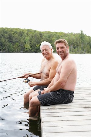 Father and Son Fishing on Dock Foto de stock - Sin royalties Premium, Código: 600-01694229