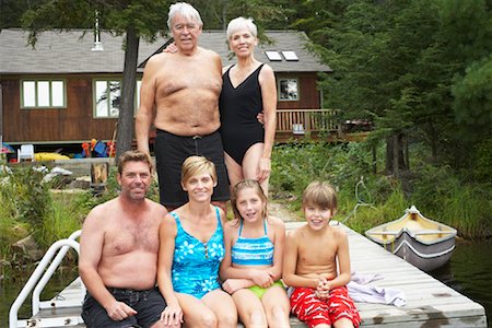 senior women in swimsuits - Extended Family on Dock by Cottage Stock Photo - Premium Royalty-Free, Code: 600-01694220