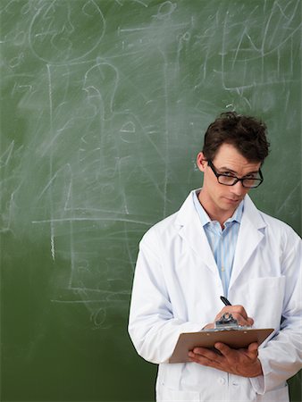 scientist clipboard - Scientist Taking Notes Foto de stock - Sin royalties Premium, Código: 600-01695324