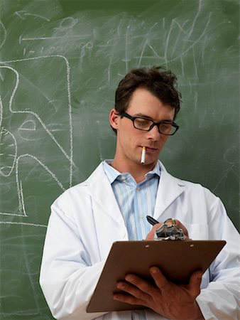 scientist and teacher photo - Man in Lab Coat Smoking Stock Photo - Premium Royalty-Free, Code: 600-01695328