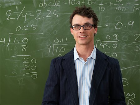 Teacher in Front of Blackboard Foto de stock - Sin royalties Premium, Código: 600-01695344