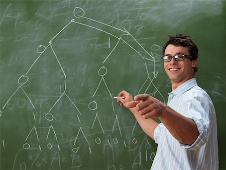 Teacher at Blackboard Stock Photo - Premium Royalty-Free, Code: 600-01695341