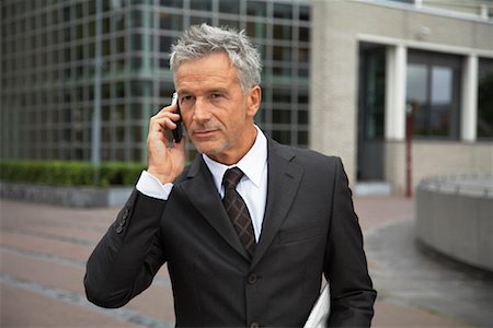 suit 60 years old man - Businessman with Cellular Phone, Amsterdam, Netherlands Stock Photo - Premium Royalty-Free, Code: 600-01695562