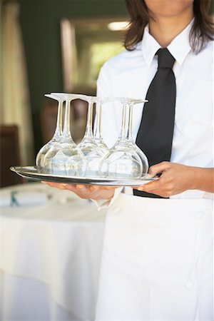 simsearch:600-01693926,k - Waitress Carrying Tray of Wine Glasses Stock Photo - Premium Royalty-Free, Code: 600-01693902