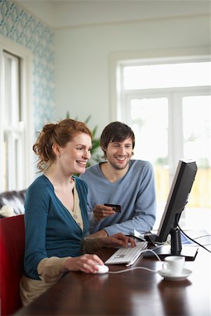 Couple with Credit Card and Computer Stock Photo - Premium Royalty-Free, Code: 600-01693968