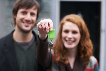 door house key - Couple with Key by House Stock Photo - Premium Royalty-Free, Code: 600-01693992