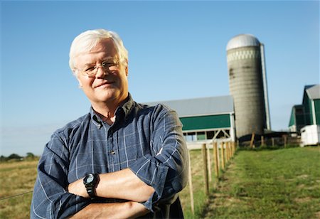 fence post - Farmer by Farm Stock Photo - Premium Royalty-Free, Code: 600-01715953