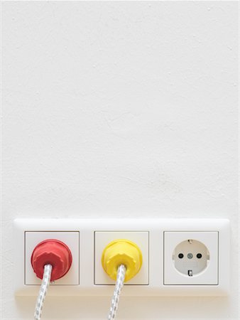 plug and socket white - Plugs in Sockets Stock Photo - Premium Royalty-Free, Code: 600-01716193