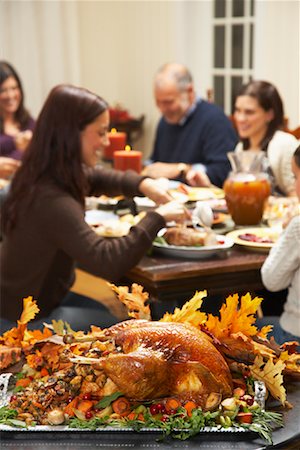 Family Having Thanksgiving Dinner Stock Photo - Premium Royalty-Free, Code: 600-01742546