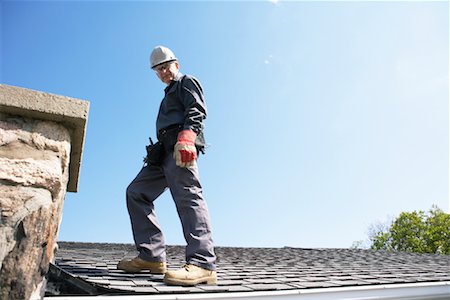 Worker on Roof Fotografie stock - Premium Royalty-Free, Codice: 600-01742662