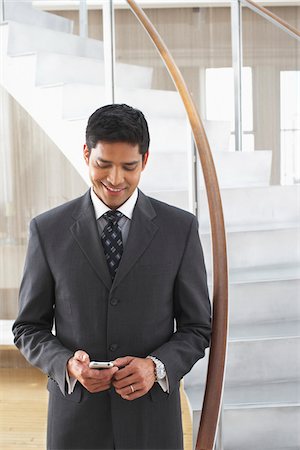 Businessman with Electronic Organizer Stock Photo - Premium Royalty-Free, Code: 600-01753592