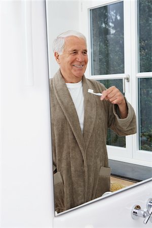 Man Brushing Teeth Stock Photo - Premium Royalty-Free, Code: 600-01764412