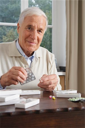 senior men - Man Taking Medication Stock Photo - Premium Royalty-Free, Code: 600-01764466