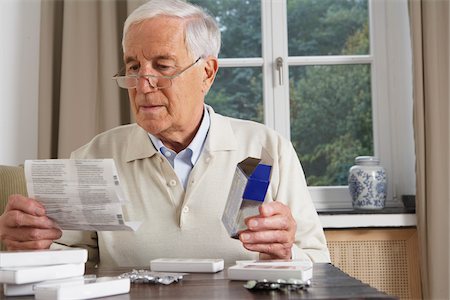 prescription - Man Taking Medication Stock Photo - Premium Royalty-Free, Code: 600-01764468