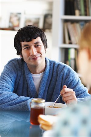 people eating honey - Couple Eating Breakfast Stock Photo - Premium Royalty-Free, Code: 600-01764671