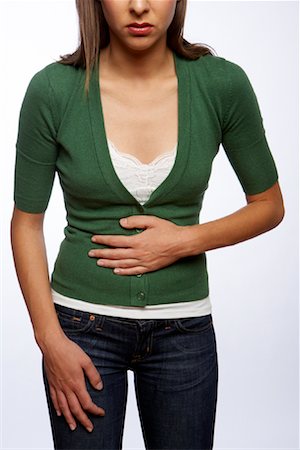 Woman with Stomach Ache Stock Photo - Premium Royalty-Free, Code: 600-01765010