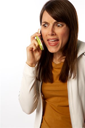 Annoyed Woman on Cell Phone Foto de stock - Sin royalties Premium, Código: 600-01765030