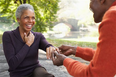 short hair for 50 year old afro american woman - Man Proposing to Woman in City Park, New York City, New York, USA Stock Photo - Premium Royalty-Free, Code: 600-01787337