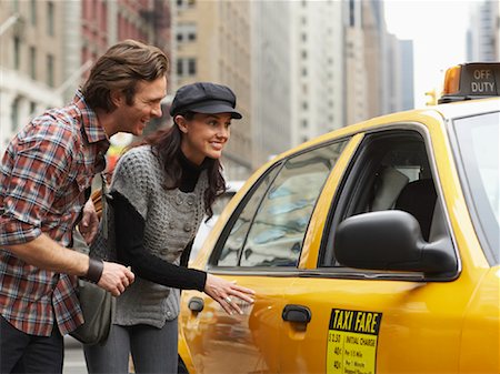 Couple Hailing Taxi Cab, New York City, New York, USA Stock Photo - Premium Royalty-Free, Code: 600-01787369