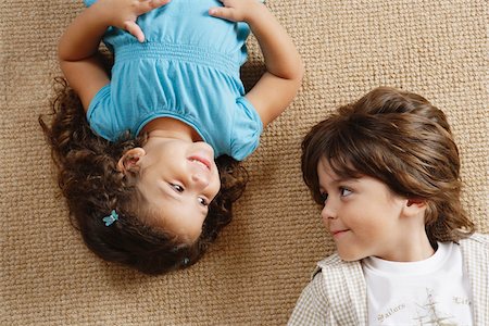 family lying on carpet - Portrait of Brother and Sister Stock Photo - Premium Royalty-Free, Code: 600-01787578