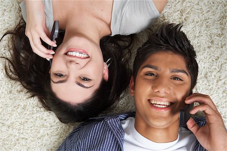 Couple Talking on Cell Phones Foto de stock - Sin royalties Premium, Código: 600-01787700