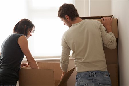simsearch:693-03440797,k - Couple with Boxes in New Home Stock Photo - Premium Royalty-Free, Code: 600-01838257