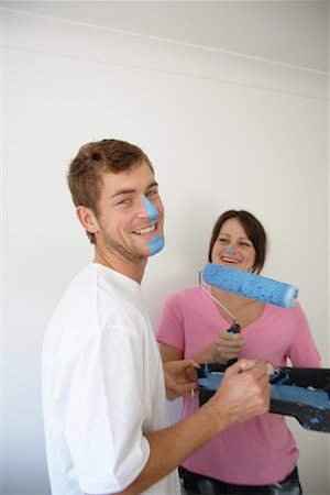 simsearch:600-03556563,k - Couple with Wall Paint on Faces Foto de stock - Sin royalties Premium, Código: 600-01838288