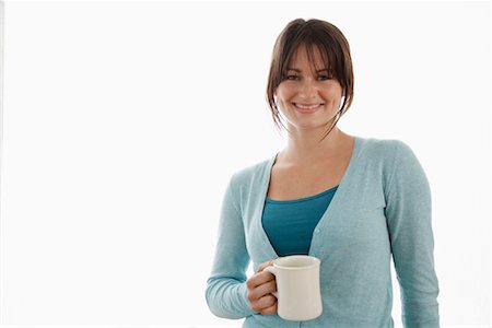 simsearch:600-02033682,k - Portrait de femme avec une tasse de café Photographie de stock - Premium Libres de Droits, Code: 600-01838323