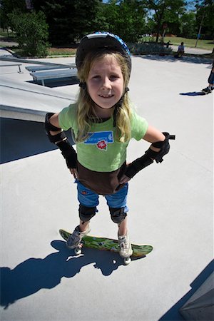 skate girl alone - Girl with Skateboard in Skate Park Stock Photo - Premium Royalty-Free, Code: 600-01879145