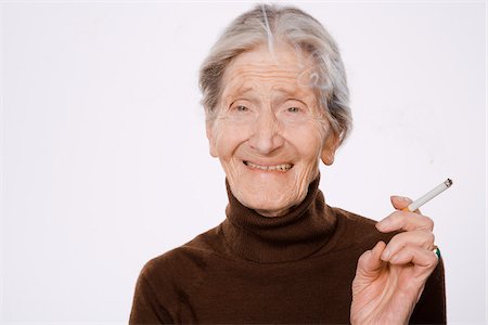 pictures of 80 year old women - Woman Smoking Foto de stock - Sin royalties Premium, Código: 600-01879181