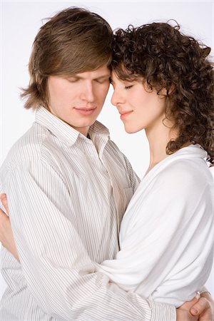 front profile portrait eyes closed studio - Portrait of Couple Stock Photo - Premium Royalty-Free, Code: 600-01954238