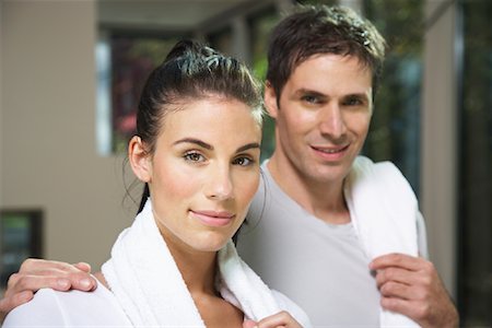 Portrait of Couple Exercising in Home Foto de stock - Royalty Free Premium, Número: 600-01954802